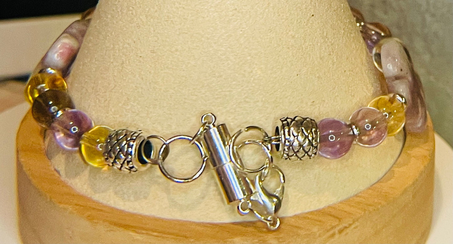 Amethyst Flower wire bracelet 8” with matching earrings.  Bracelet can be resized.