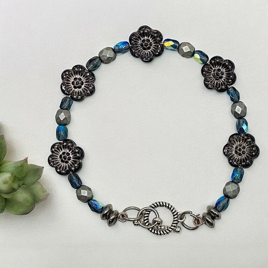 Jet and Hematite with Czech flowers wire bracelet 7.25”