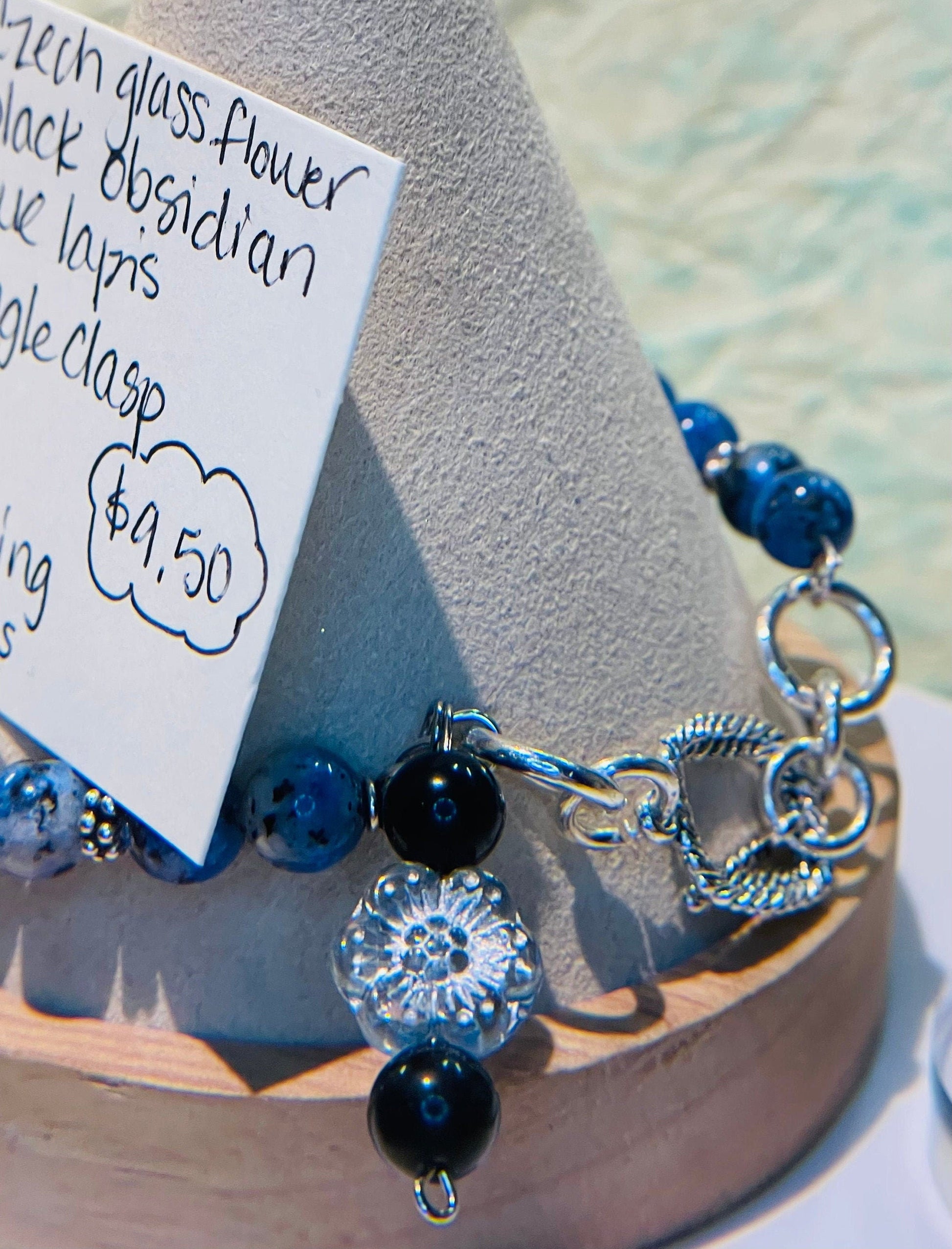 Czech glass flower, blue lapis, and black obsidian bracelet 7.5&quot;-8&quot; with matching earrings