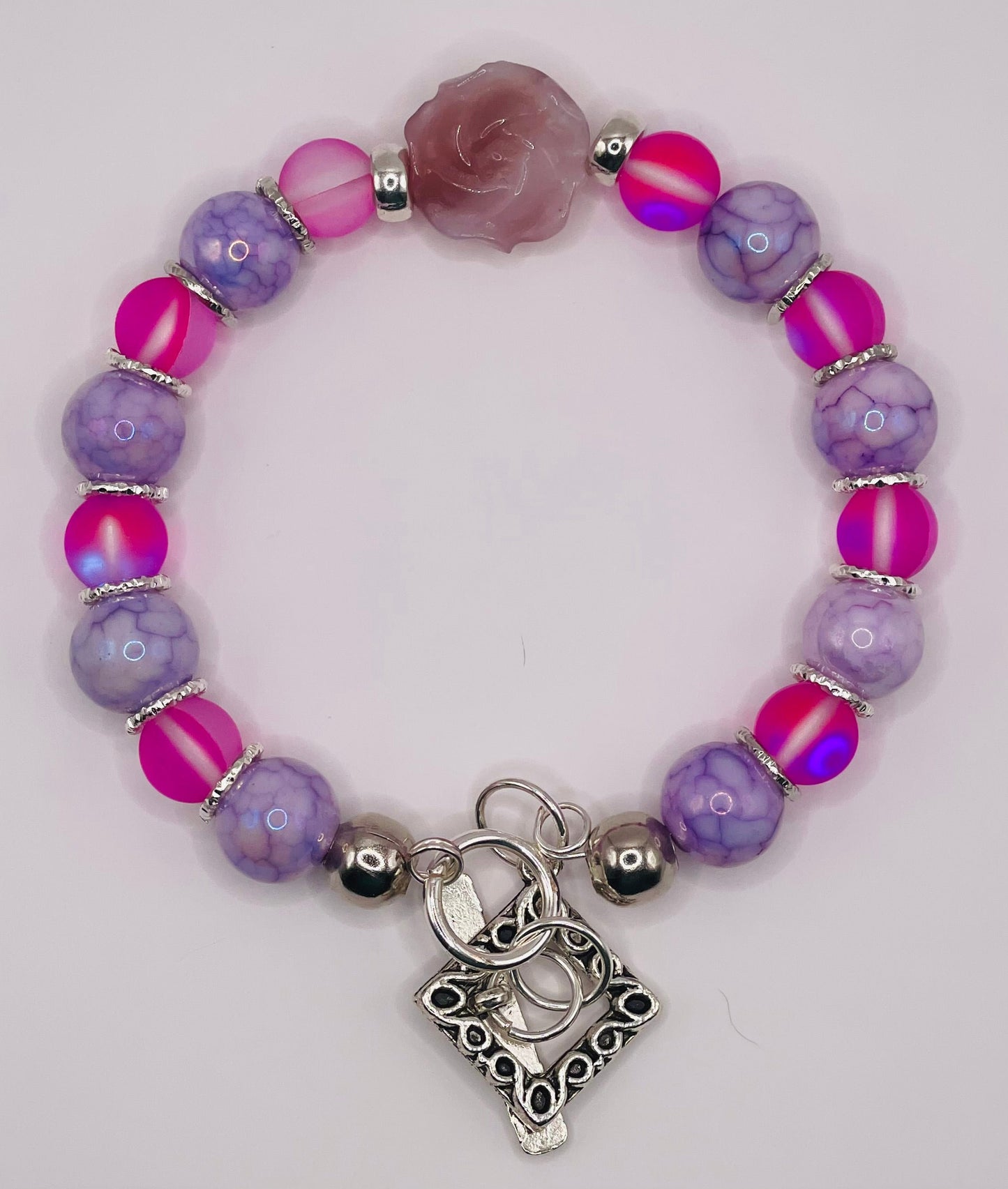 Tourmaline carved petal bracelet with purple and pink stones- Diamond toggle clasp. 7.5&quot;