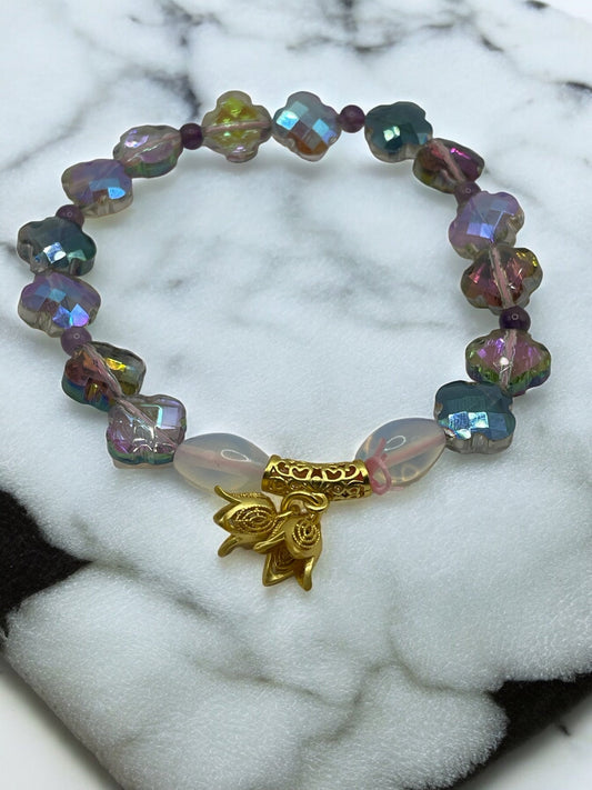 Lucky clover shaped multi-colored faceted cut bracelet with gold dangle floral charm 7.5&quot;