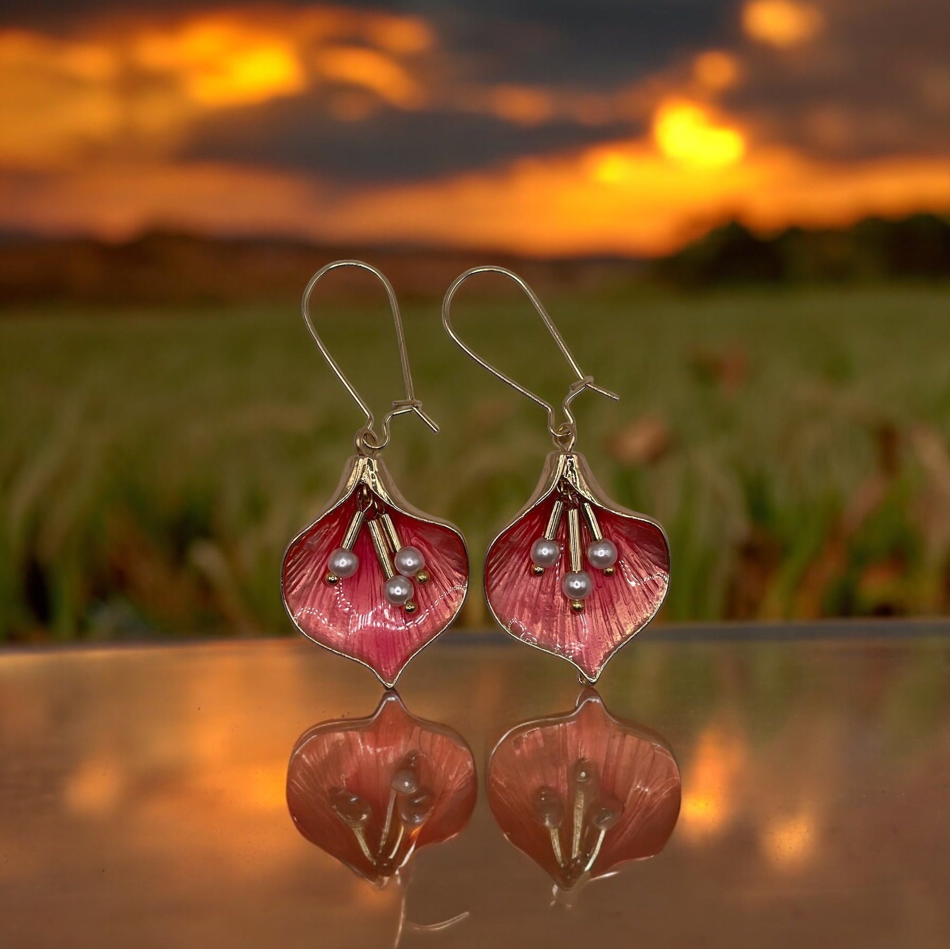 Coral and pearl-inspired petal shaped gold tone earrings